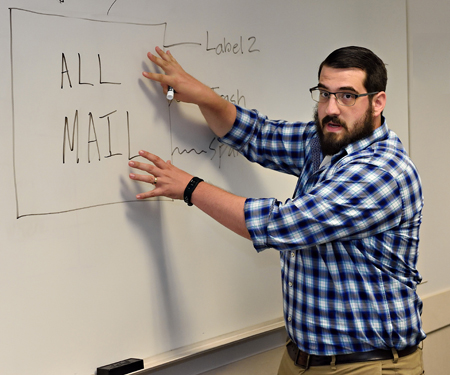 Man teaching in classroom