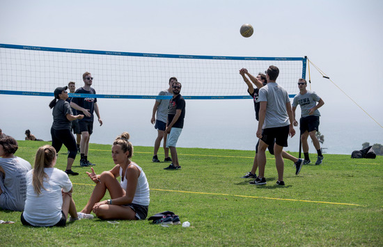 students playing volleyball