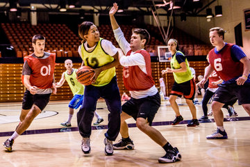 Students playing intramural basketball
