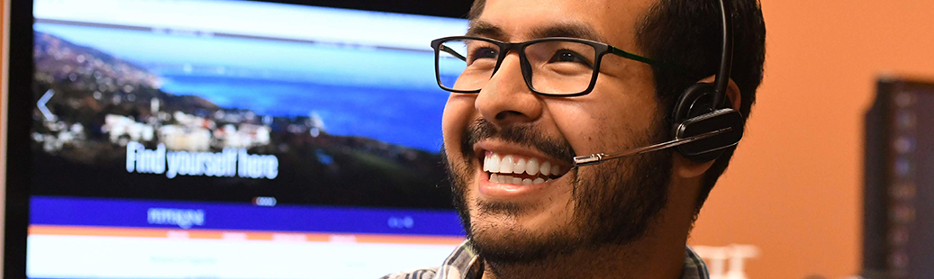 Smiling male technician in headset