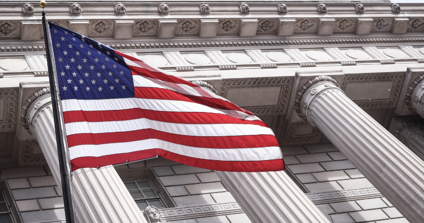 United States flag flyinig in front of the US Supreme Court building 