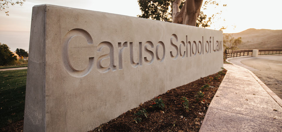 Caruso School of Law concrete sign