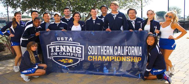Members of the club tennis team holding their Southern California championship banner