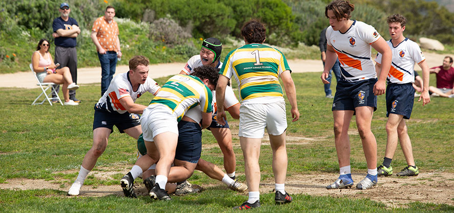 Students playing rugby on Alumni Park
