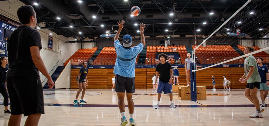 Students playing intramural volleyball