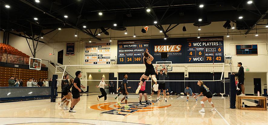 Students playing intramural volleyball