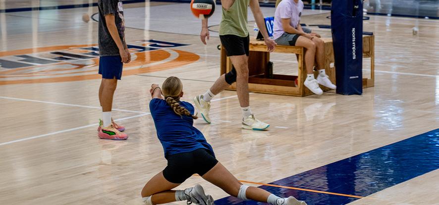 Students playing intramural volleyball