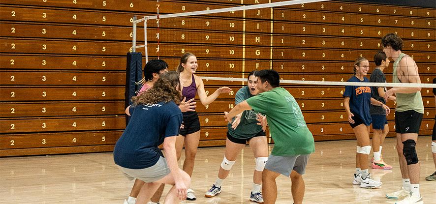 Students playing intramural volleyball