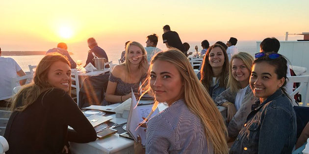 Seaver students enjoying the sunset in Santorini, Greece