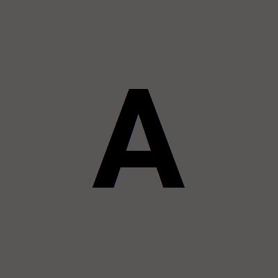 Example of poor color contrast with the letter A in black text on a dark gray background.
