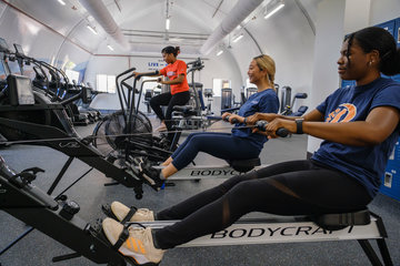 Students on the rowing machine