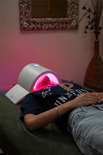 Student with Red Light Therapy